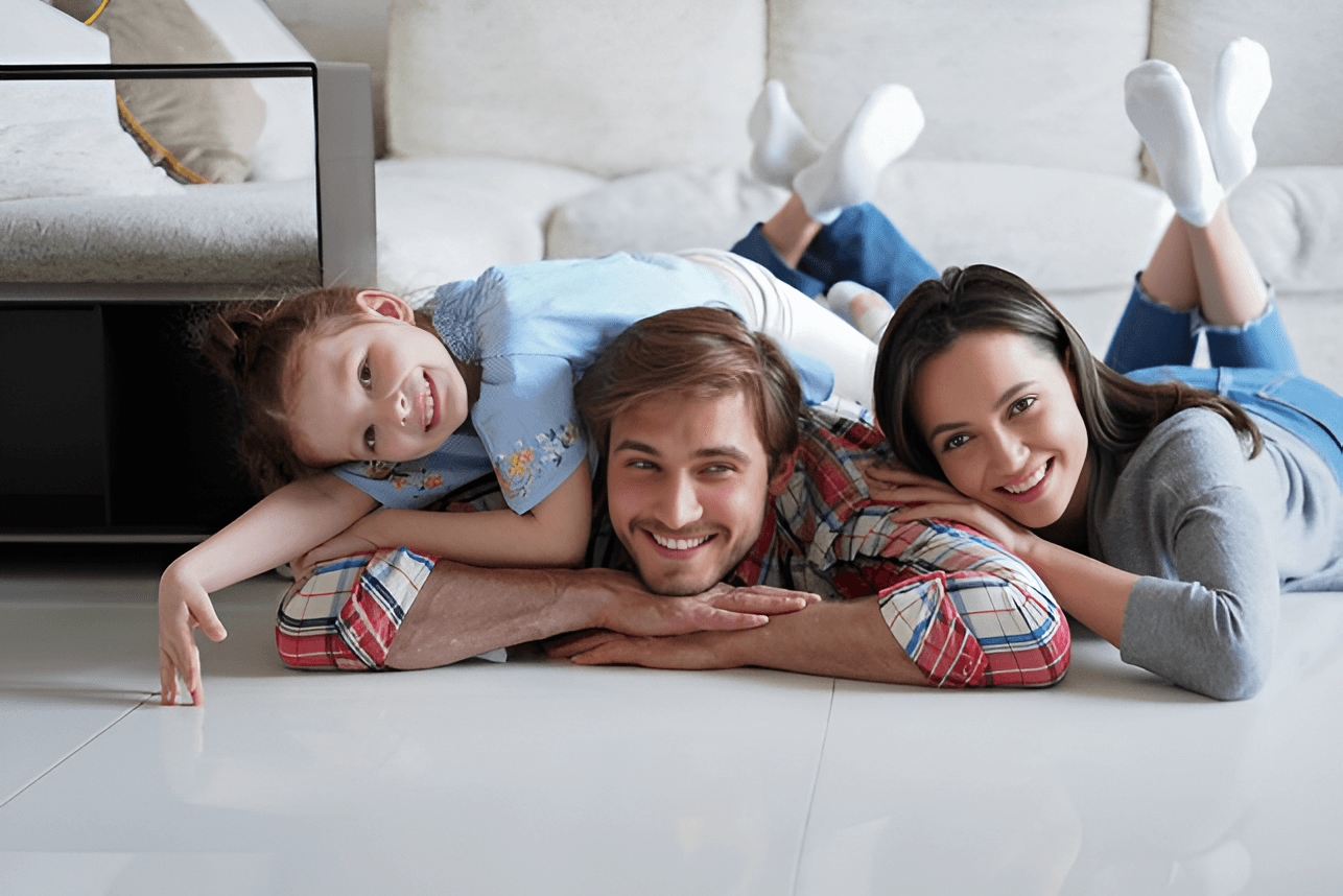 Happy family enjoying their beautifully floored home